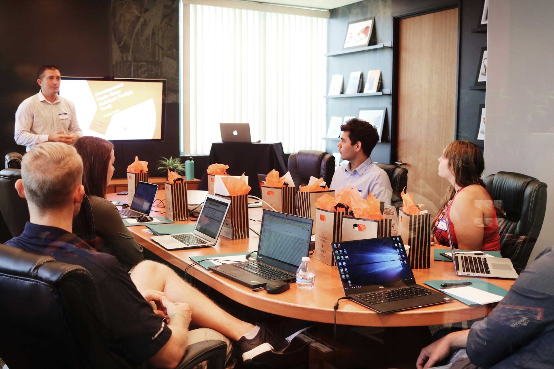 Team gathered around a table during a collaborative working session
